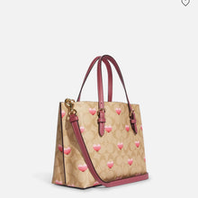 Cargar imagen en el visor de la galería, MOLLIE TOTE 25 IN SIGNATURE CANVAS WITH STRIPE HEART PRINT
